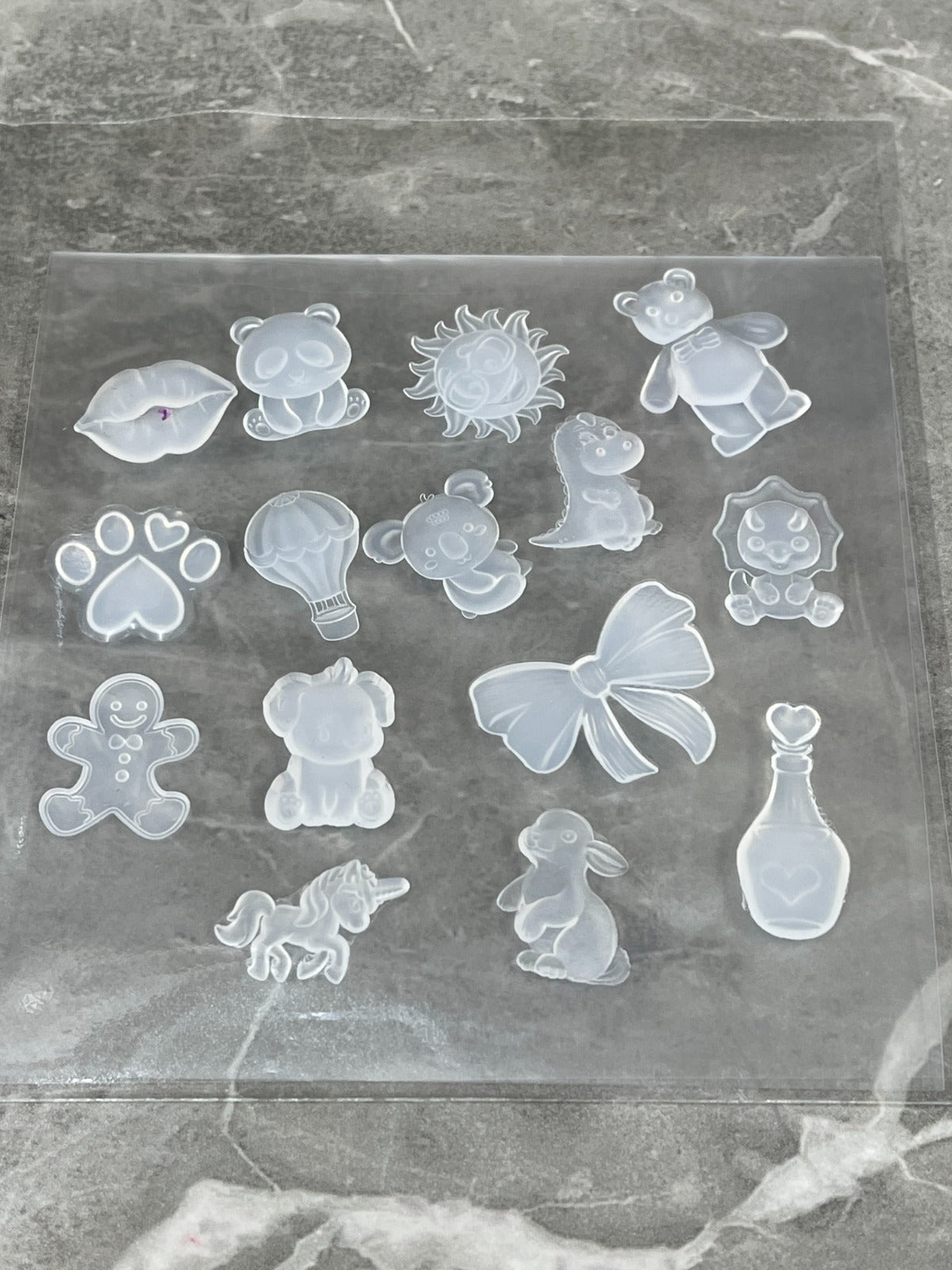 Set of 15 tiny, borderless, silicone inlays